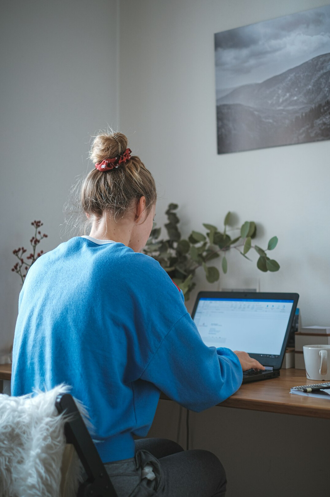 woman learning digital skills on laptop