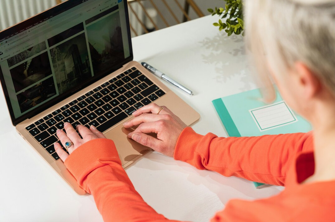 woman learning digital skills on laptop