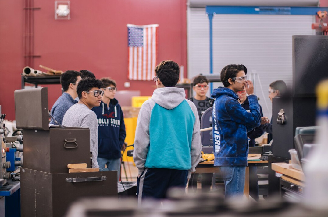 group of people in workshop