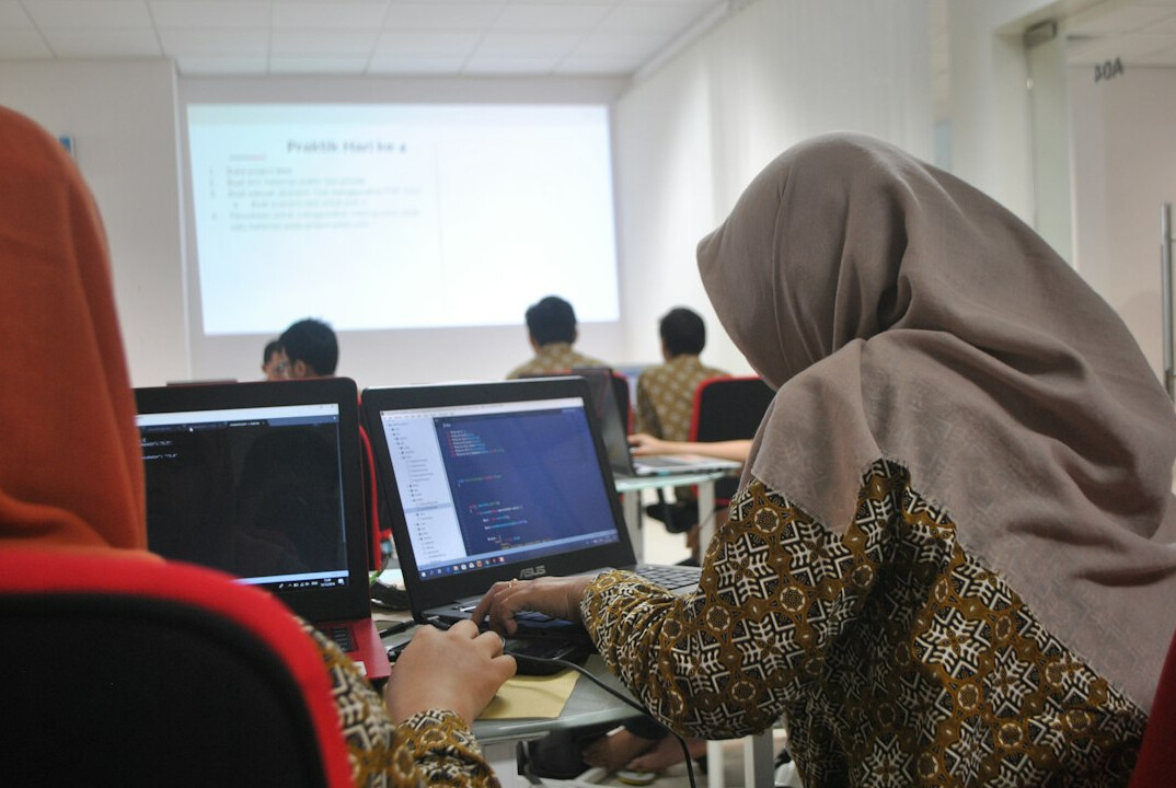 group of adults in computer class